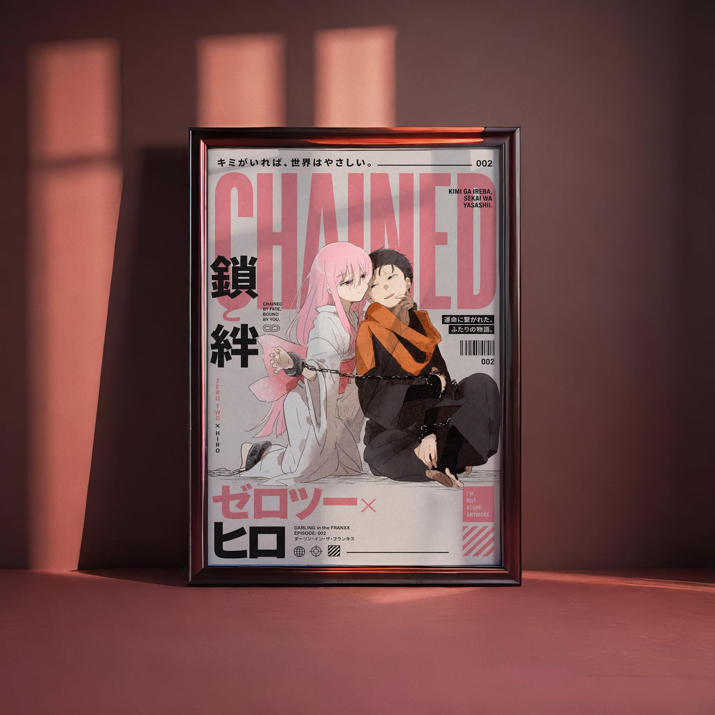 The image is a framed poster featuring an illustration of two anime characters, one with pink hair and the other with dark hair, sitting together. The poster has a pink and black color scheme and includes Japanese text.