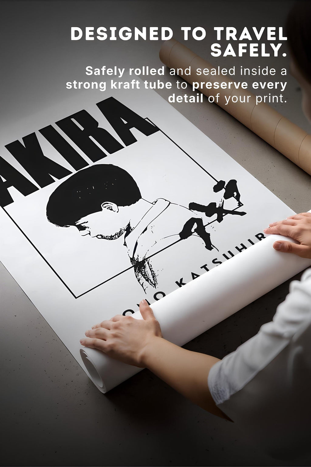 A person is rolling up a poster featuring a character from the anime series "Akira".