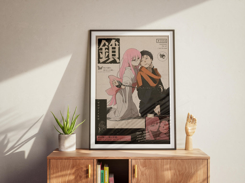 a framed poster of an anime-style illustration, which appears to be a collage of multiple images. The poster is displayed on a wooden cabinet or shelf, and there is a potted plant and a small figurine on the cabinet as well.